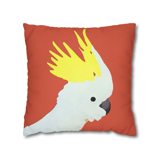 red cushion with sulfur-crested cocktoo print
